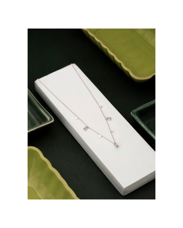 CP-110 Delicate silver-toned chain adorned with a mix of rectangular baguette-cut crystals